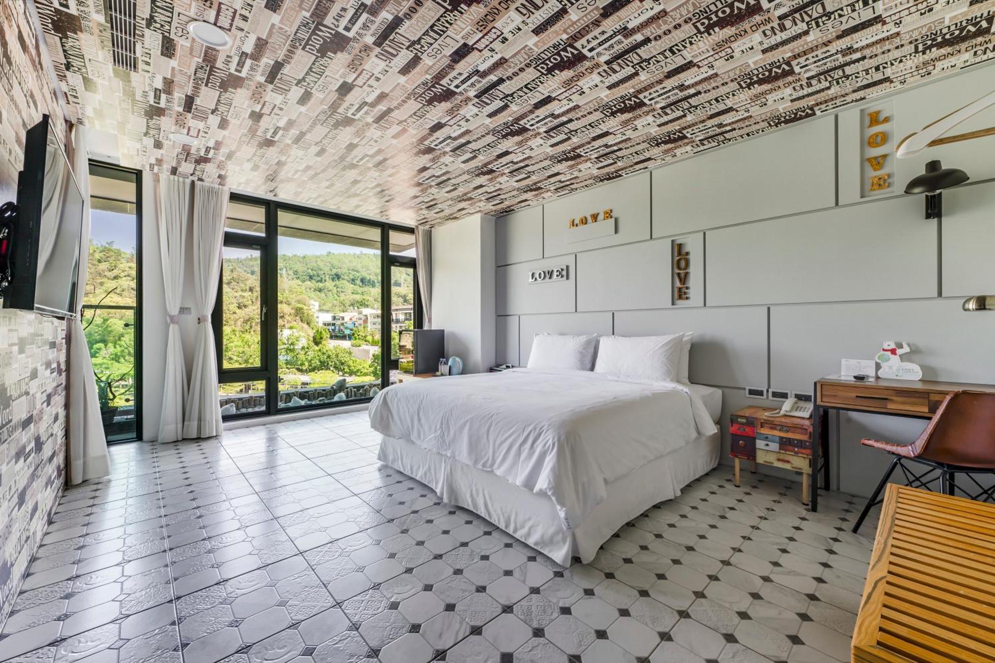 Han Yan Design Hotel Юйчи Экстерьер фото