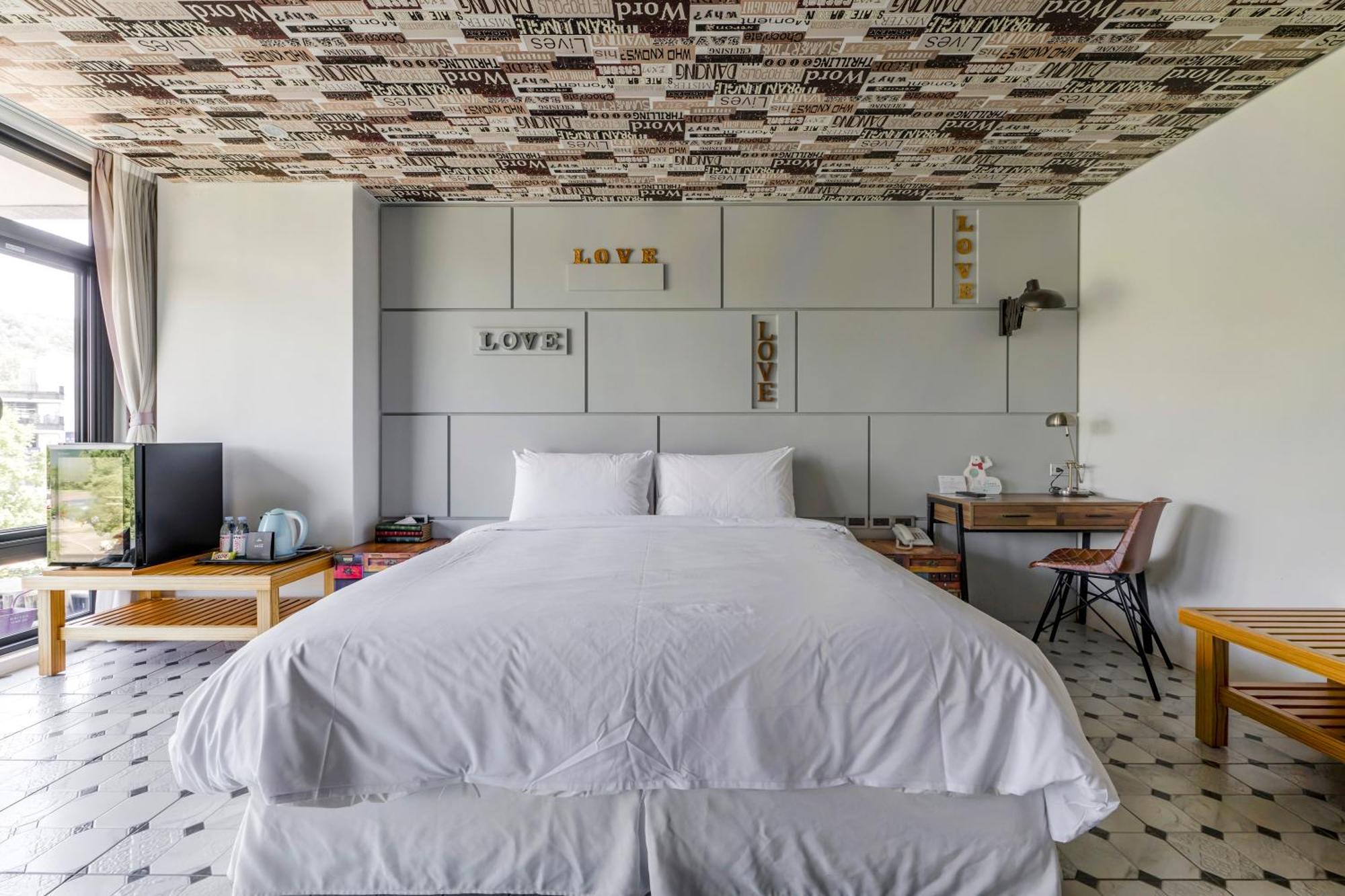 Han Yan Design Hotel Юйчи Экстерьер фото