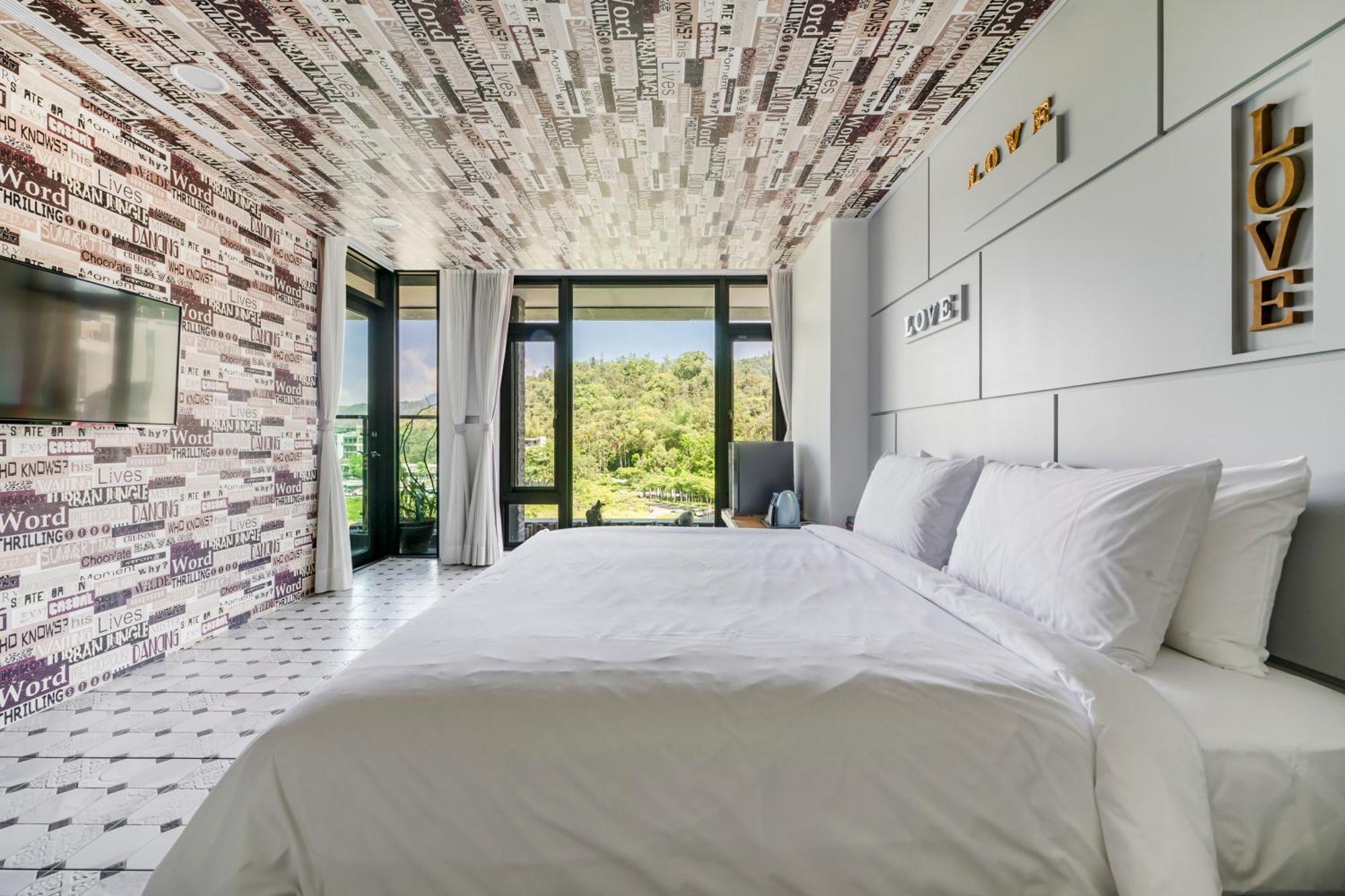 Han Yan Design Hotel Юйчи Экстерьер фото