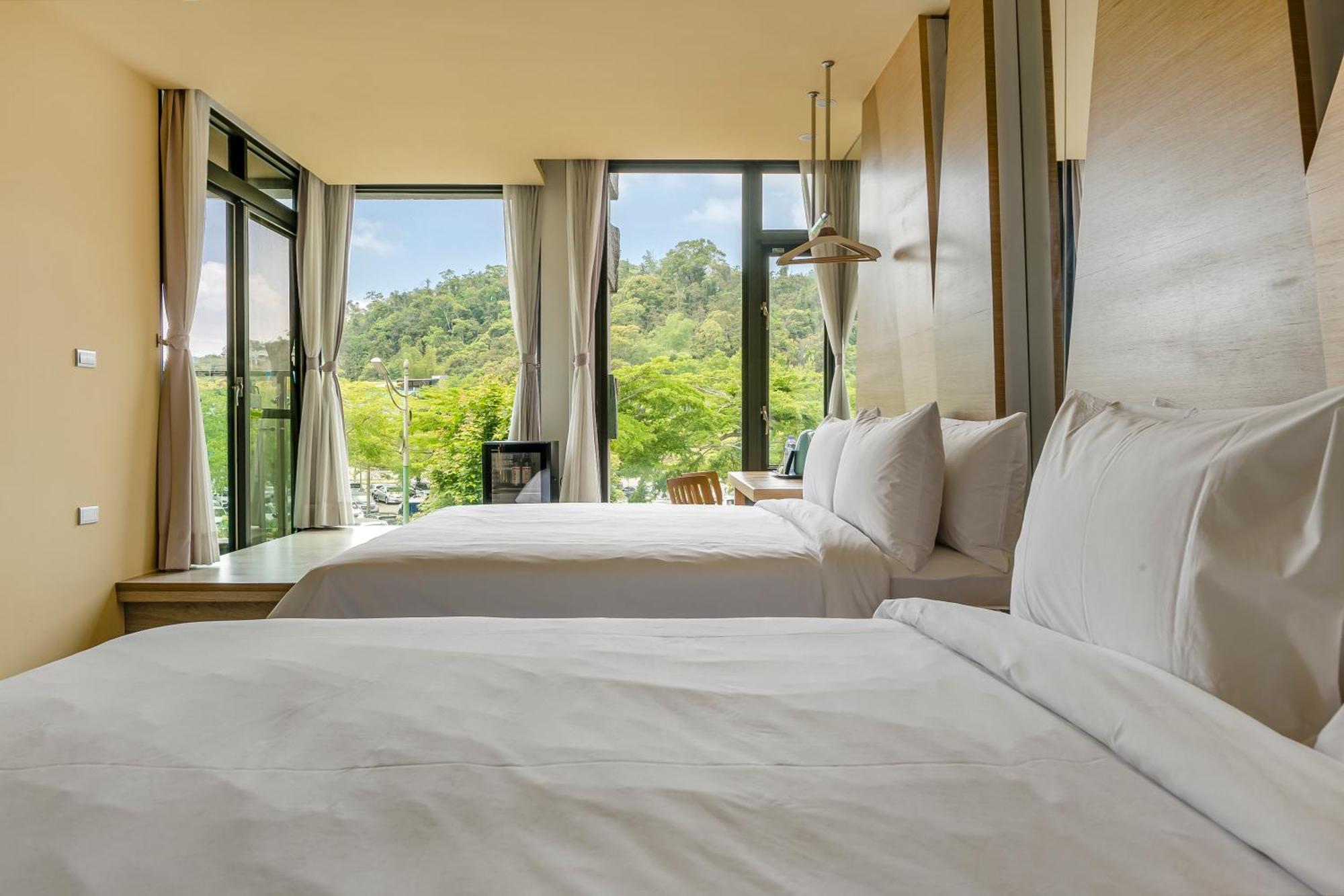 Han Yan Design Hotel Юйчи Экстерьер фото