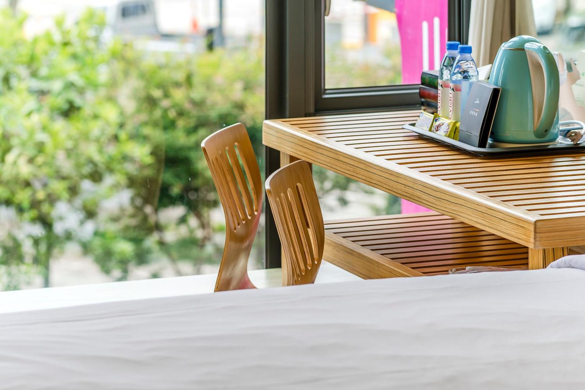 Han Yan Design Hotel Юйчи Экстерьер фото
