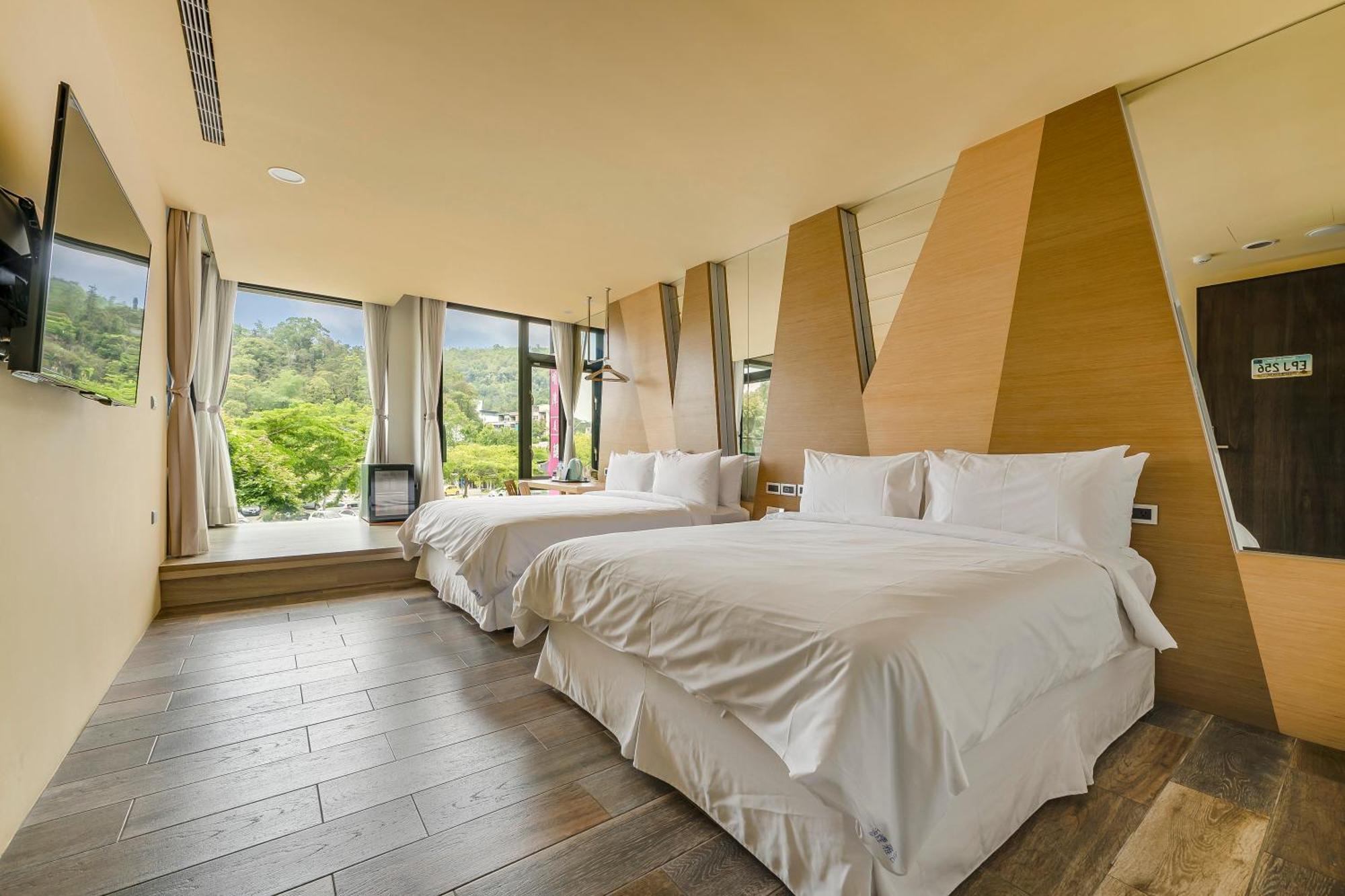 Han Yan Design Hotel Юйчи Экстерьер фото